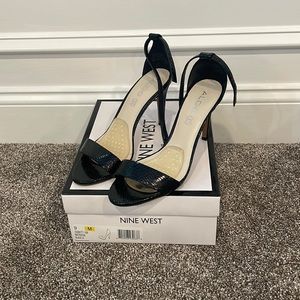 Aldo snake skin stiletto heels.